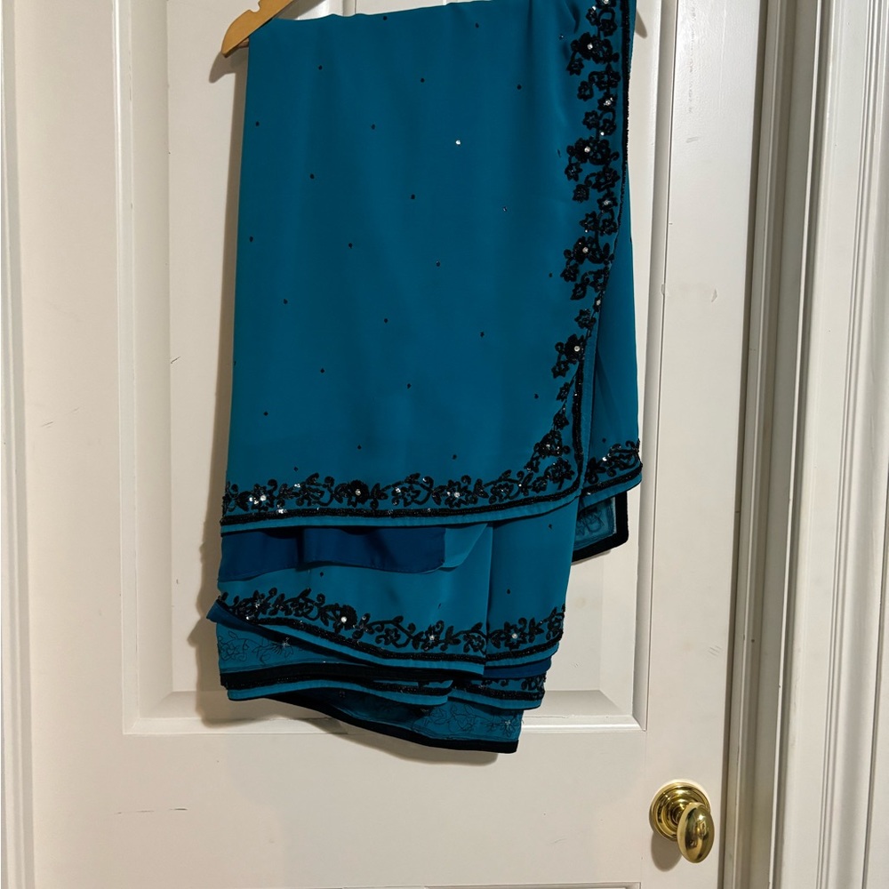 Teal Women’s Saree with Black Sequin Floral Border